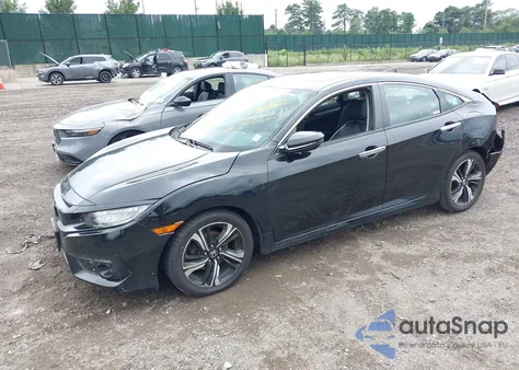 2017 Honda Civic Touring z USA, uszkodzony, nr VIN 2HGFC1F91HH657184